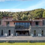 Palombaggia, villa pied dans l&rsquo;eau, 7 chambres, piscine à débordement, vue mer panoramique, plage à pied